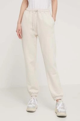 Zdjęcie produktu Herschel spodnie dresowe bawełniane kolor beżowy gładkie