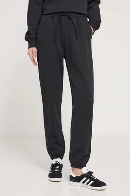 Zdjęcie produktu Herschel spodnie dresowe bawełniane kolor czarny gładkie