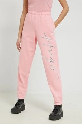 Zdjęcie produktu HUGO spodnie dresowe bawełniane damskie kolor różowy z nadrukiem
