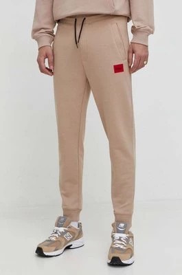 Zdjęcie produktu HUGO spodnie dresowe bawełniane kolor beżowy melanżowe 50447963