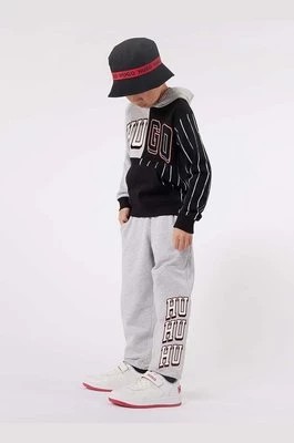 Zdjęcie produktu HUGO spodnie dresowe dziecięce kolor szary z nadrukiem