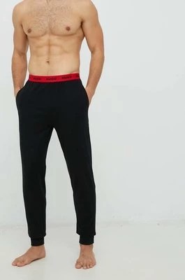 Zdjęcie produktu HUGO spodnie piżamowe męskie kolor czarny gładka 50480236