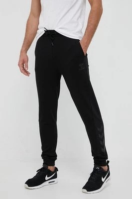 Zdjęcie produktu Hummel spodnie dresowe hmlISAM 2.0 REGULAR PANTS kolor czarny z nadrukiem 214336