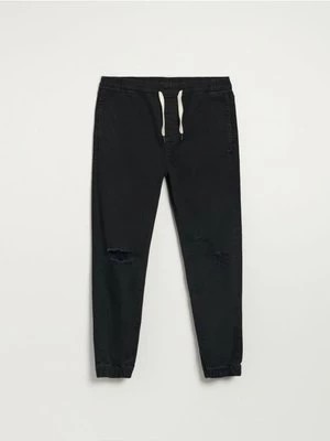 Zdjęcie produktu Jeansowe joggery z elastycznym pasem vintage czarne House