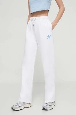 Zdjęcie produktu Juicy Couture spodnie dresowe kolor biały z aplikacją