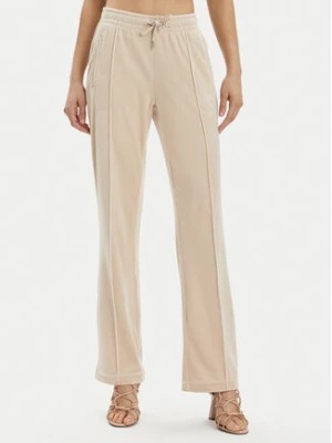 Zdjęcie produktu Juicy Couture Spodnie dresowe Tina JCAPW045 Beżowy Regular Fit