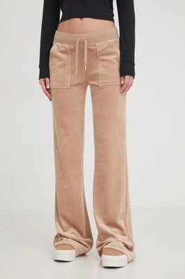 Zdjęcie produktu Juicy Couture spodnie dresowe welurowe kolor beżowy gładkie