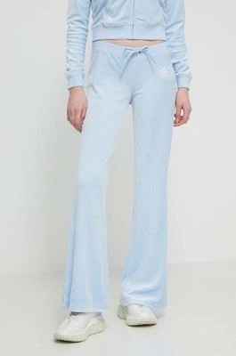 Zdjęcie produktu Juicy Couture spodnie dresowe welurowe kolor niebieski z aplikacją