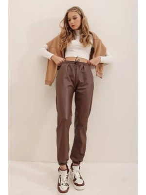 Zdjęcie produktu Jumeon Spodnie w kolorze brązowym rozmiar: M