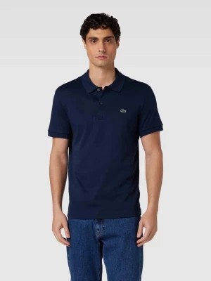 Zdjęcie produktu Koszulka polo o kroju regular fit w jednolitym kolorze Lacoste
