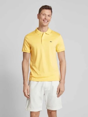 Zdjęcie produktu Koszulka polo o kroju regular fit w jednolitym kolorze Lacoste