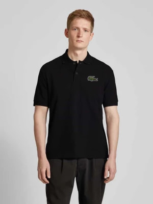 Zdjęcie produktu Koszulka polo o luźnym kroju z naszywką z logo Lacoste