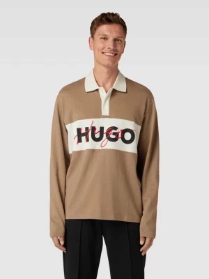 Zdjęcie produktu Koszulka polo z nadrukiem z logo model ‘Dilvret’ HUGO