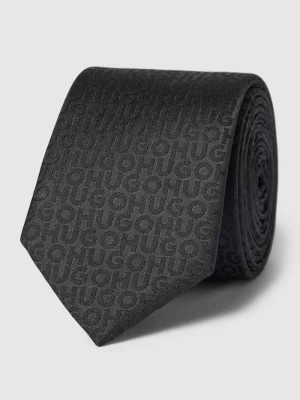 Zdjęcie produktu Krawat ze wzorem z logo na całej powierzchni HUGO