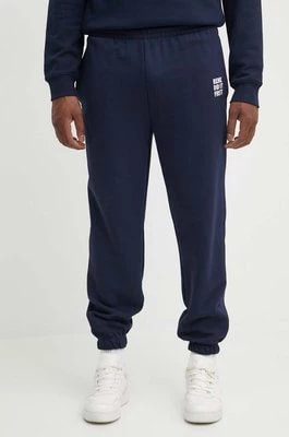 Zdjęcie produktu Lacoste spodnie dresowe kolor granatowy z aplikacją