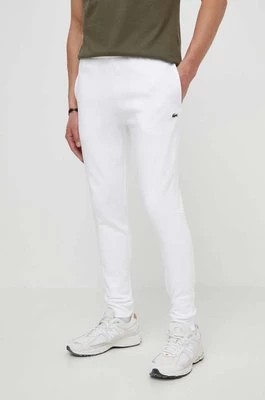 Zdjęcie produktu Lacoste spodnie dresowe męskie kolor biały gładkie