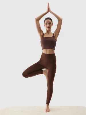 Zdjęcie produktu Legginsy do jogi z materiału z recyklingu damskie - brązowe 4F