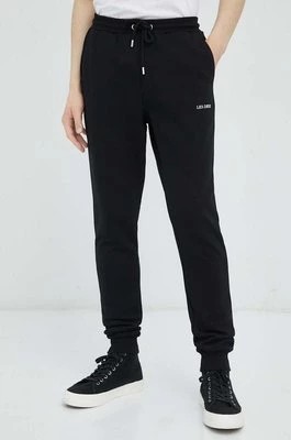 Zdjęcie produktu Les Deux spodnie dresowe bawełniane kolor czarny z nadrukiem