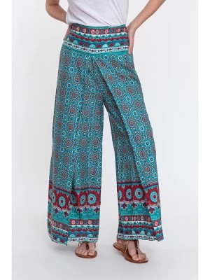 Zdjęcie produktu Makani Spodnie w kolorze turkusowym ze wzorem rozmiar: 34-38