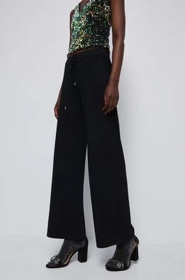 Zdjęcie produktu Medicine spodnie damskie kolor czarny szerokie medium waist
