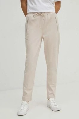 Zdjęcie produktu Medicine spodnie dresowe damskie kolor beżowy gładkie