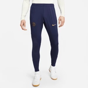 Zdjęcie produktu Męskie dzianinowe spodnie piłkarskie Paris Saint-Germain Strike Nike Dri-FIT - Niebieski
