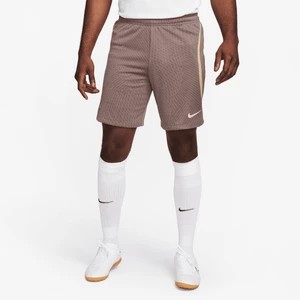 Zdjęcie produktu Męskie spodenki piłkarskie z dzianiny Nike Dri-FIT Tottenham Hotspur Strike (wersja trzecia) - Brązowy