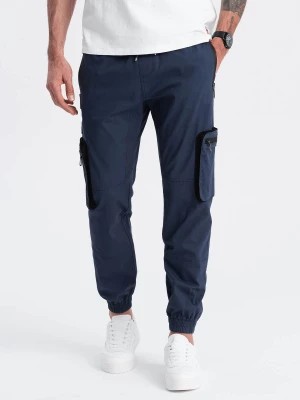 Zdjęcie produktu Męskie spodnie JOGGERY z zapinanymi kieszeniami cargo - granatowe V5 OM-PAJO-0135
 -                                    L
