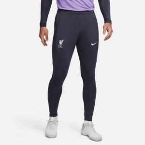 Zdjęcie produktu Męskie spodnie piłkarskie z dzianiny Nike Dri-FIT Liverpool F.C. Strike (wersja trzecia) - Szary