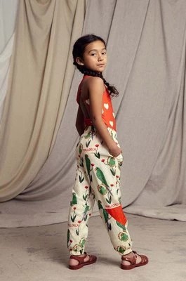 Zdjęcie produktu Mini Rodini spodnie dresowe dziecięce Parrots kolor beżowy wzorzyste