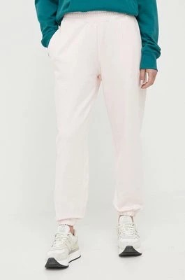 Zdjęcie produktu New Balance spodnie dresowe bawełniane kolor różowy gładkie