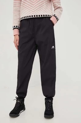 Zdjęcie produktu New Balance spodnie dresowe damskie kolor czarny gładkie