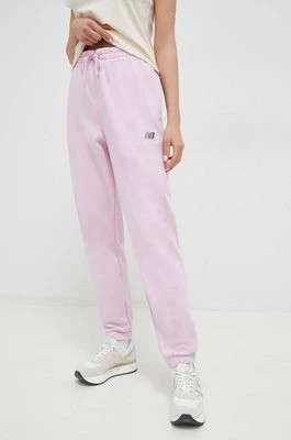 Zdjęcie produktu New Balance spodnie dresowe kolor różowy z aplikacją