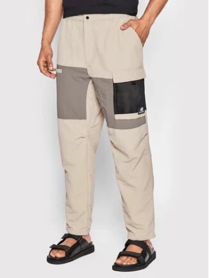 Zdjęcie produktu New Balance Spodnie materiałowe MP21502 Beżowy Relaxed Fit