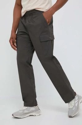 Zdjęcie produktu New Balance spodnie męskie kolor zielony proste