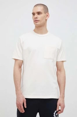 Zdjęcie produktu New Balance t-shirt bawełniany kolor beżowy gładki
