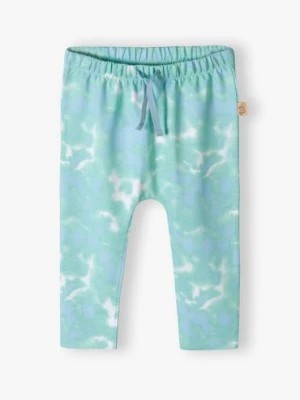Zdjęcie produktu Niebieskie bawełniane wybarwiane spodnie dresowe niemowlęce 5.10.15.