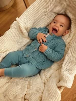 Zdjęcie produktu Niebieskie legginsy niemowlęce z falbankami na nogawkach 5.10.15.
