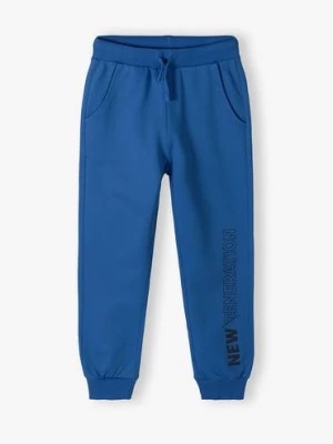 Zdjęcie produktu Niebieskie spodnie dresowe dla chłopca - New Generation Lincoln & Sharks by 5.10.15.