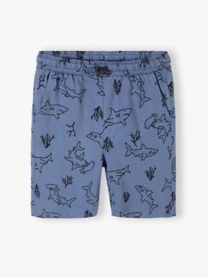 Zdjęcie produktu Niebieskie szorty bawełniane dla chłopca z rekinami 5.10.15.