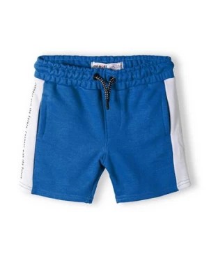 Zdjęcie produktu Niebieskie szorty dresowe niemowlęce z białymi paskami Minoti
