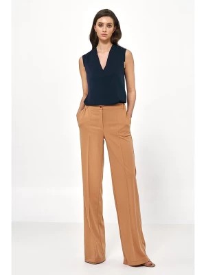 Zdjęcie produktu Nife Spodnie w kolorze jasnobrązowym rozmiar: 36