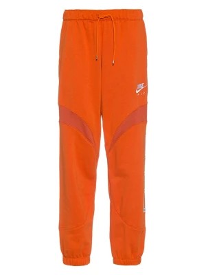 Zdjęcie produktu Nike Spodnie dresowe "NSW Air" w kolorze pomarańczowym rozmiar: L