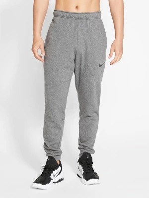Zdjęcie produktu Nike Spodnie dresowe w kolorze szarym rozmiar: M
