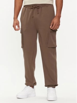 Zdjęcie produktu Outhorn Spodnie dresowe OTHAW23TTROM513 Khaki Regular Fit
