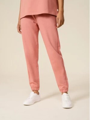 Zdjęcie produktu Outhorn Spodnie dresowe OTHSS23TTROF173 Różowy Regular Fit