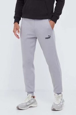 Zdjęcie produktu Puma spodnie dresowe męskie kolor szary gładkie 586715