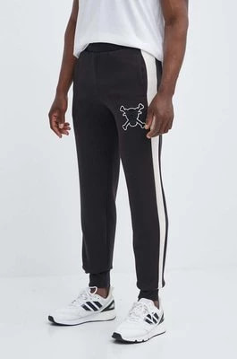 Zdjęcie produktu Puma spodnie dresowe PUMA X ONE PIECE kolor czarny wzorzyste 624671