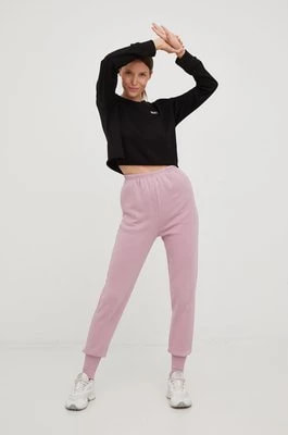 Zdjęcie produktu Reebok Classic spodnie dresowe damskie kolor różowy gładkie
