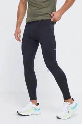 Zdjęcie produktu Reebok legginsy do biegania Run Base Layer kolor czarny gładkie